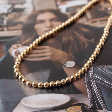 Collar Ball 5mm oro 14k