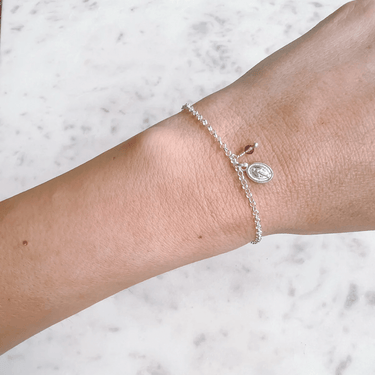 Pulsera Virgen de los Rayos Rubí Plata - Atesorame