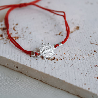 Pulsera San Benito Hilo Rojo Plata