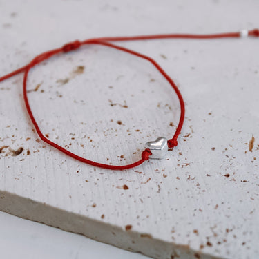 Pulsera Corazón mini hilo rojo - Atesorame